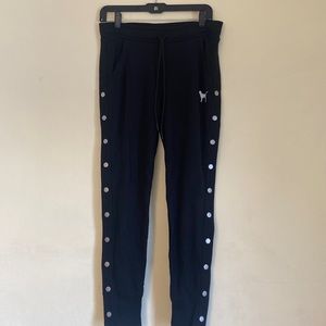 PINK skinny joggers with studs on the legs